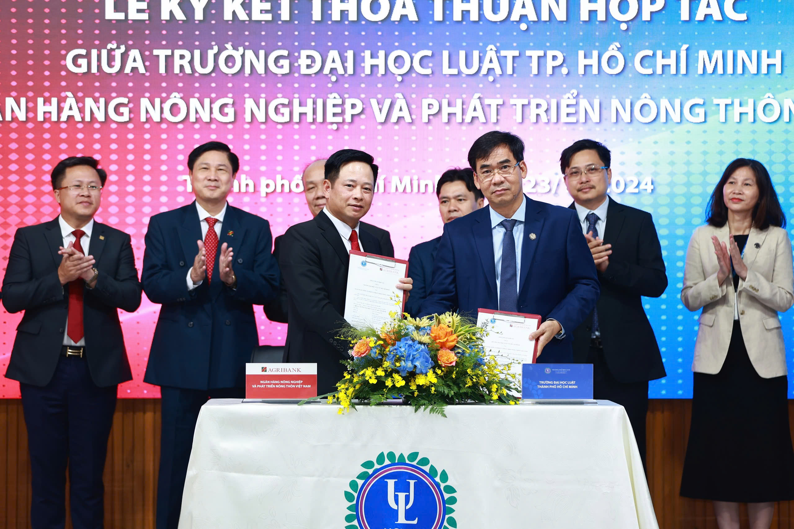 Trường ĐH Luật TP HCM hợp tác đào tạo và nghiên cứu khoa học ngành ngân hàng- Ảnh 1.