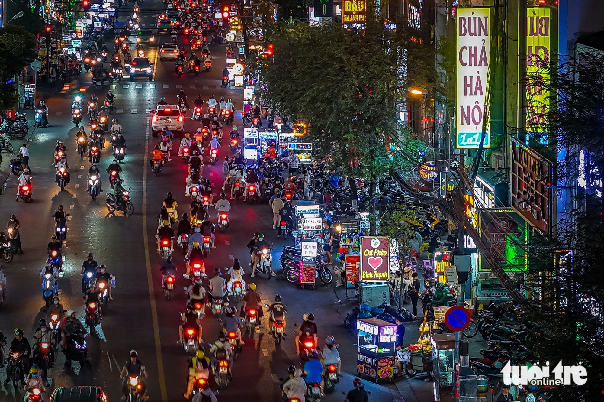 Quận Bình Thạnh, Gò Vấp lên tiếng sau phản ánh vỉa hè bị xà xẻo của báo Tuổi Trẻ - Ảnh 2.