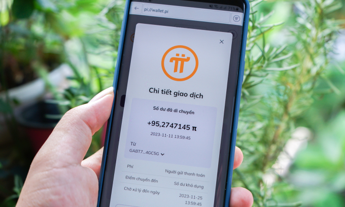 Một smartphone hiển thị giao dịch tiền ảo Pi trong thử nghiệm của dự án này vào năm 2023. Ảnh: Bảo Lâm