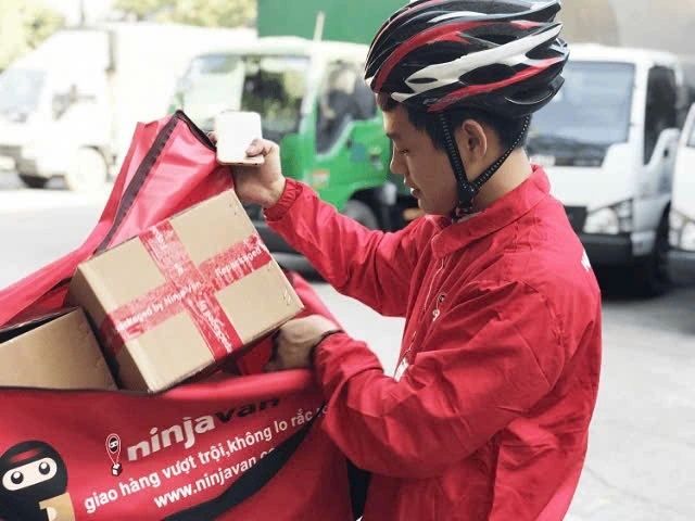 Giao hàng nhanh - cuộc chơi ngày càng khốc liệt- Ảnh 2. Giao hàng nhanh - cuộc chơi ngày càng khốc liệt- Ảnh 2.