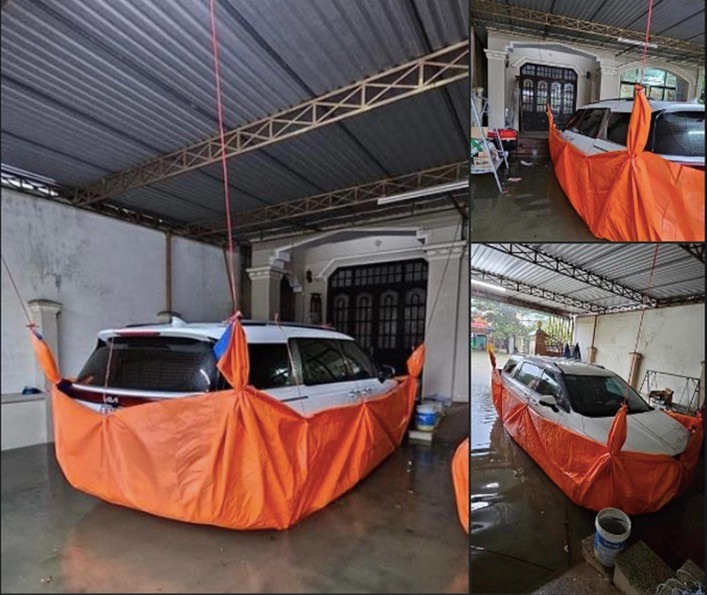 Muôn kiểu bảo vệ ô tô độc lạ của người Việt mùa mưa bão- Ảnh 2. Muôn kiểu bảo vệ ô tô độc lạ của người Việt mùa mưa bão- Ảnh 2.