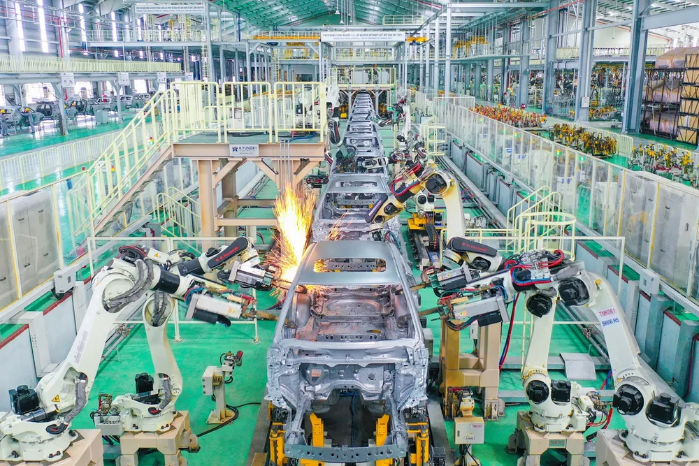 Nghị quyết 57 đặt tầm nhìn năm 2045, tỉ lệ doanh nghiệp công nghệ số Việt Nam tương đương các nước phát triển; tối thiểu có 10 doanh nghiệp công nghệ số ngang tầm các nước tiên tiến. Ảnh: QH robot-thaco.jpg