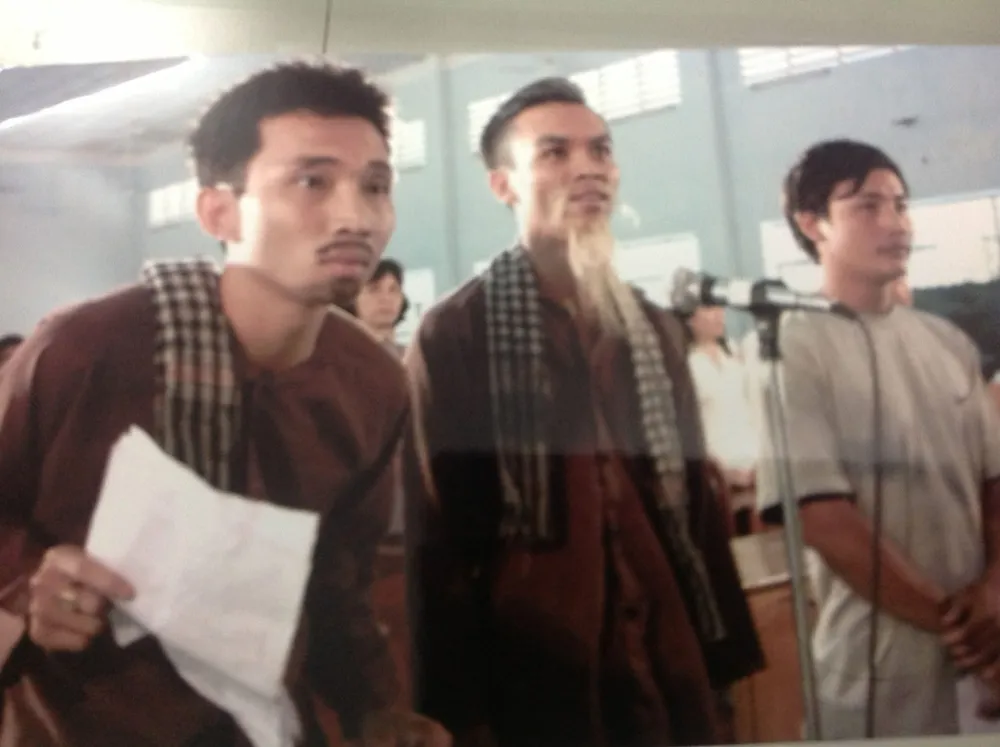 Ông Dương Phi Anh (giữa) tham gia phiên tòa giả định nhằm tuyên truyền pháp luật khi còn làm phóng viên Báo Pháp Luật TP.HCM. duong phi anh.jpeg