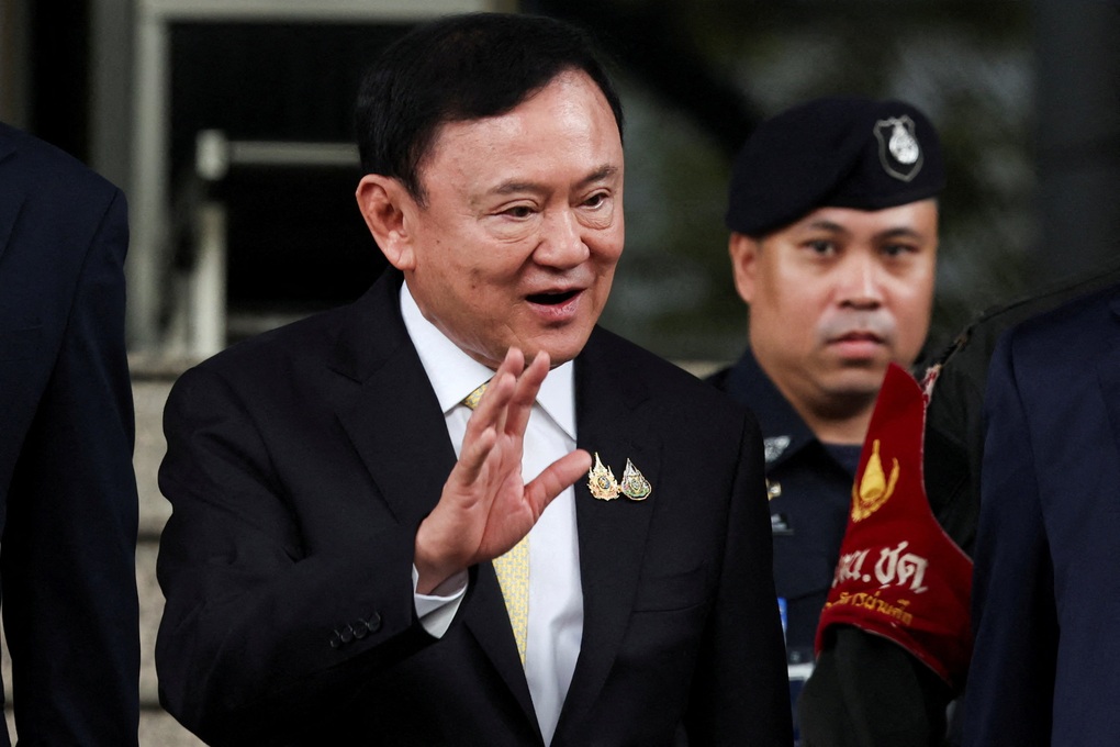 Ông Thaksin trở về Thái Lan trước ngày tòa ra phán quyết - 1