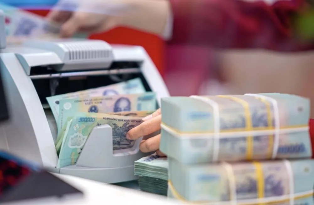 Lãi suất giá rẻ là một trong những trợ lực giúp doanh nghiệp an tâm mở rộng quy mô sản xuất kinh doanh. Ảnh: T.L lai-suat-ngan-hang.jpeg