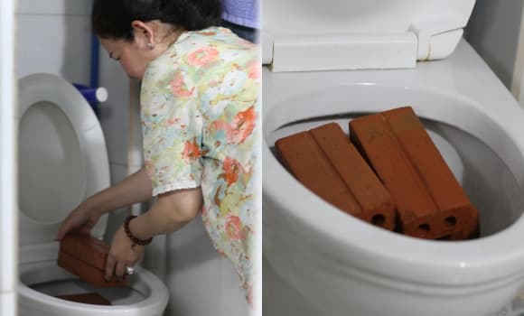 Triều cường, TP.HCM, nhét gạch vào bồn cầu