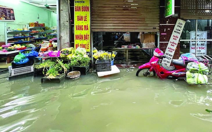 Kỹ năng sinh tồn trong vùng lũ - Ảnh 2.