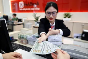 Vì sao tỉ giá khó vượt 27.000 đồng/USD?