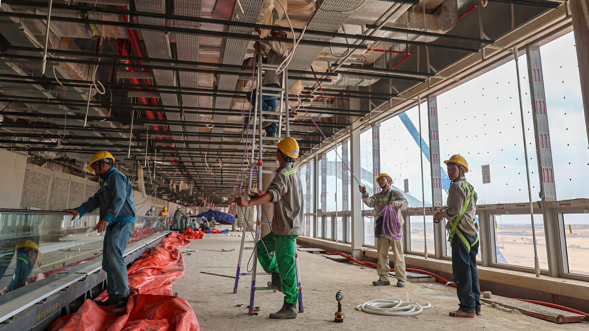 Sân bay Long Thành đón chuyến bay đầu tiên vào 19 - 12: Cận cảnh tiến độ thi công - Ảnh 10.