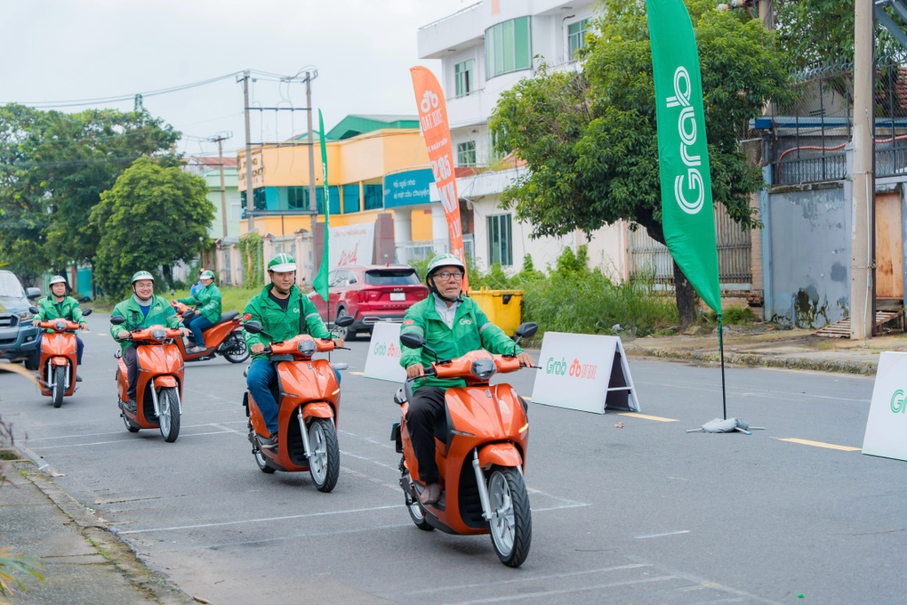 Grab Việt Nam và Dat Bike hợp tác hỗ trợ tài xế công nghệ chuyển đổi xanh - 2