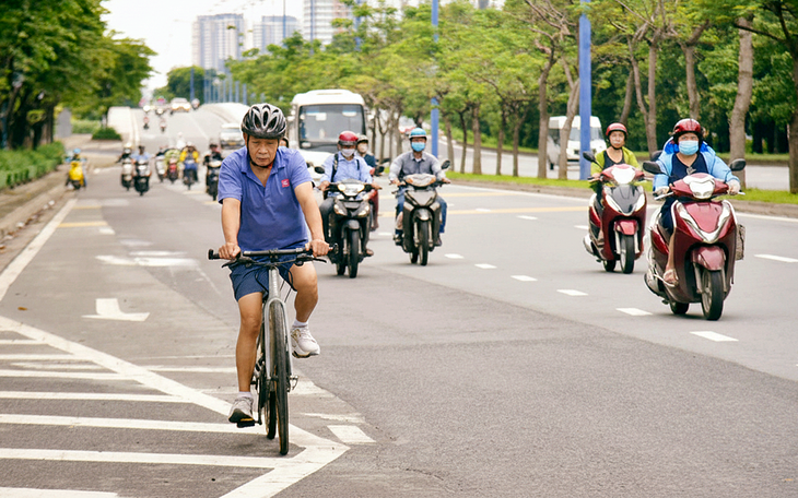 Bắt đầu thi công làn đường ưu tiên cho xe đạp trên đường Mai Chí Thọ vào ngày 10-10 - Ảnh 2.