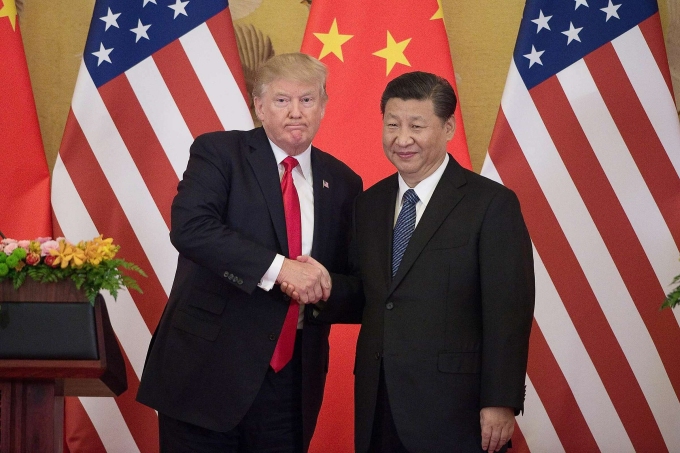 Tổng thống Mỹ Donald Trump (trái) và Chủ tịch Trung Quốc Tập Cận Bình tại Bắc Kinh hồi tháng 11/2017. Ảnh: AFP