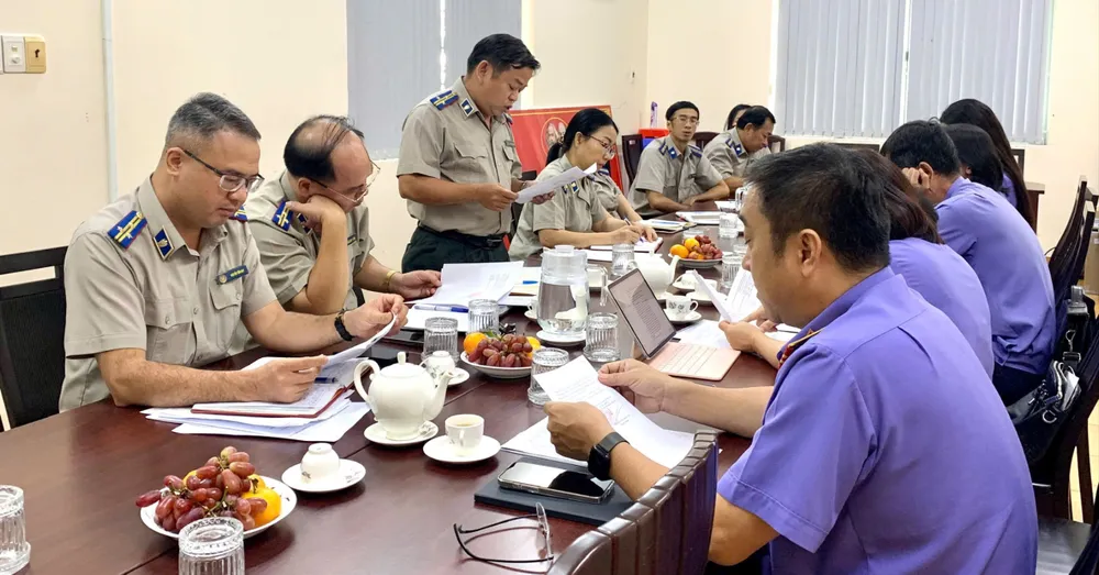 Đại diện Phòng THADS khu vực 1 - TP.HCM báo cáo tại buổi làm việc. Ảnh: PV Phòng THADS khu vực 1 - TP.HCM