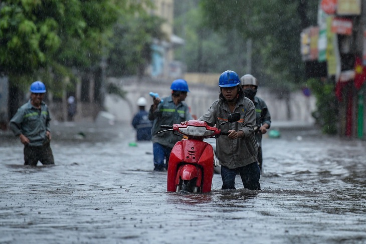 Thời tiết hôm nay 6-10: Bão đổ bộ, Bắc Bộ mưa rất to, đề phòng ngập diện rộng - Ảnh 1.