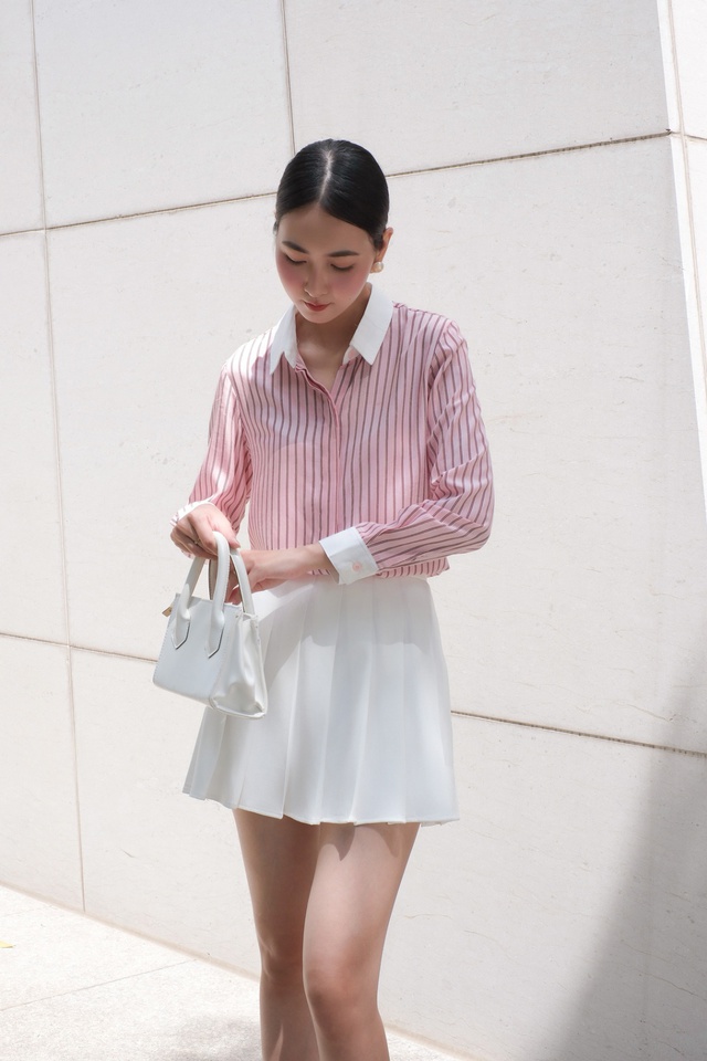 Từ đường phố đến sân pickleball, chân váy tennis khẳng định vị thế  - Ảnh 1.