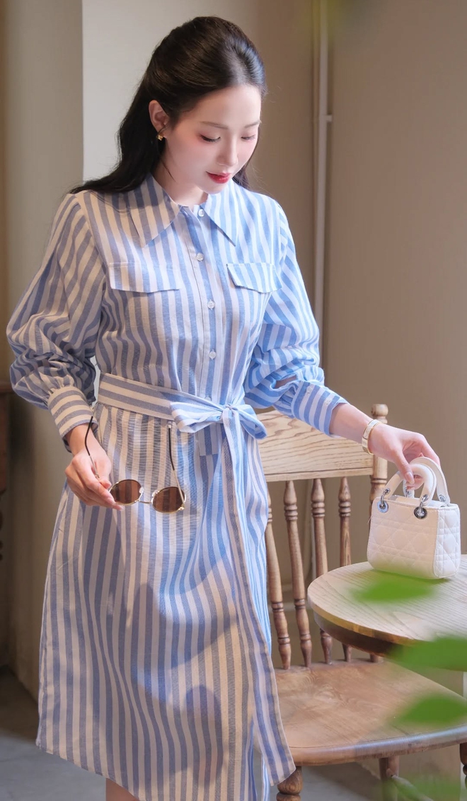 Khai mở nét thanh lịch, quyến rũ đầy ấn tượng cùng váy midi trong tiết thu 7 Khai mở nét thanh lịch, quyến rũ đầy ấn tượng cùng váy midi mùa thu(.) - Ảnh 7.