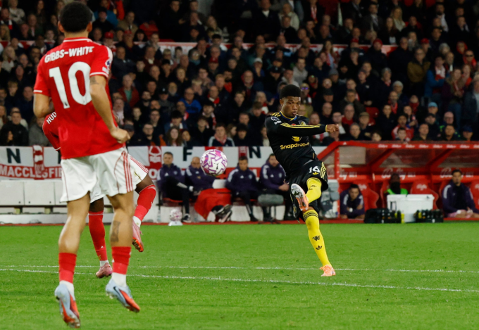 Amad Diallo vô-lê ấn định tỷ số hòa cho Man Utd. Ảnh: Reuters