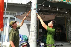 Công an 168 xã, phường, đặc khu đồng loạt ra quân xử lý quảng cáo trái phép