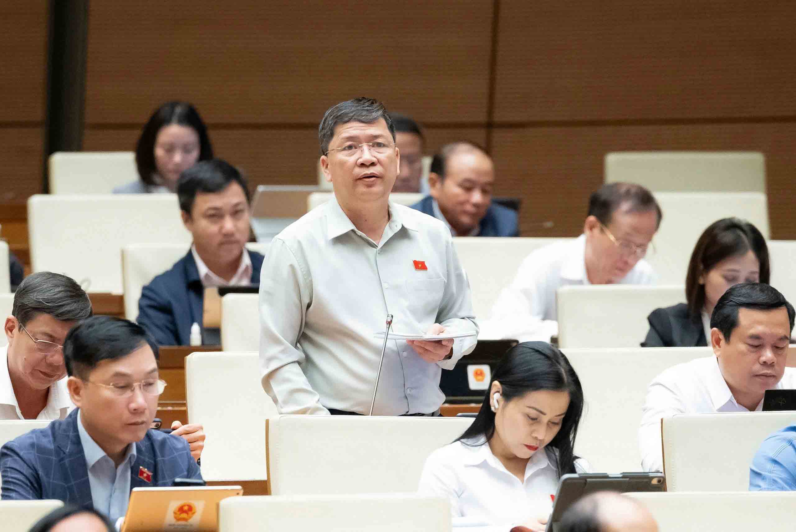 Bỏ giấy phép xây dựng, không buông lỏng hậu kiểm - Ảnh 2.