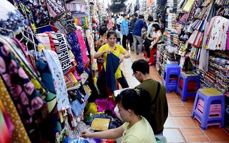 Cần xem xét nâng ngưỡng chịu thuế - Ảnh 2.