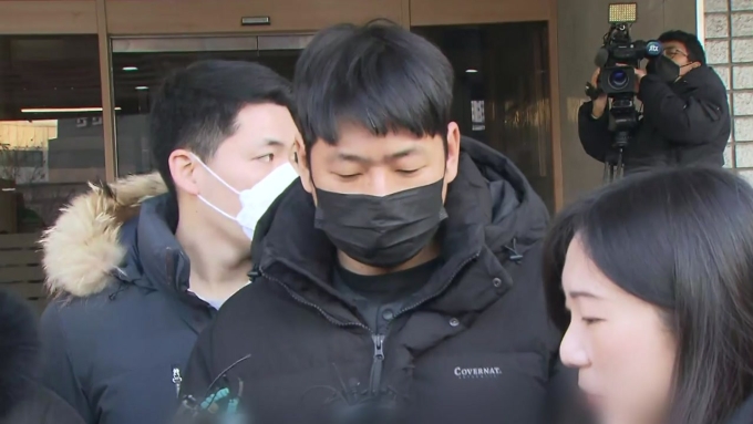 Kim Nok-wan bị cảnh sát áp giải đến cơ quan công tố vào 24/1. Ảnh: YTN