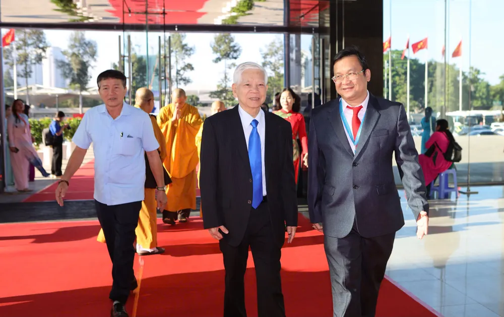 Ông Nguyễn Minh Triết, nguyên Chủ tịch nước đến tham dự đại hội. Ảnh: NGUYỆT NHI mttq-viet-nam-tp-hcm-6.jpg