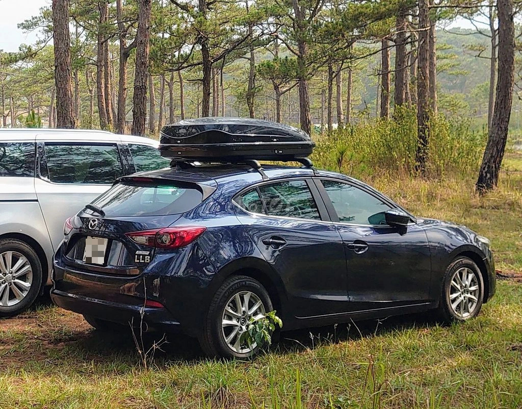 Gắn cốp nắp phi thuyền có ảnh hưởng đến vận hành của ô tô? - Ảnh 1.