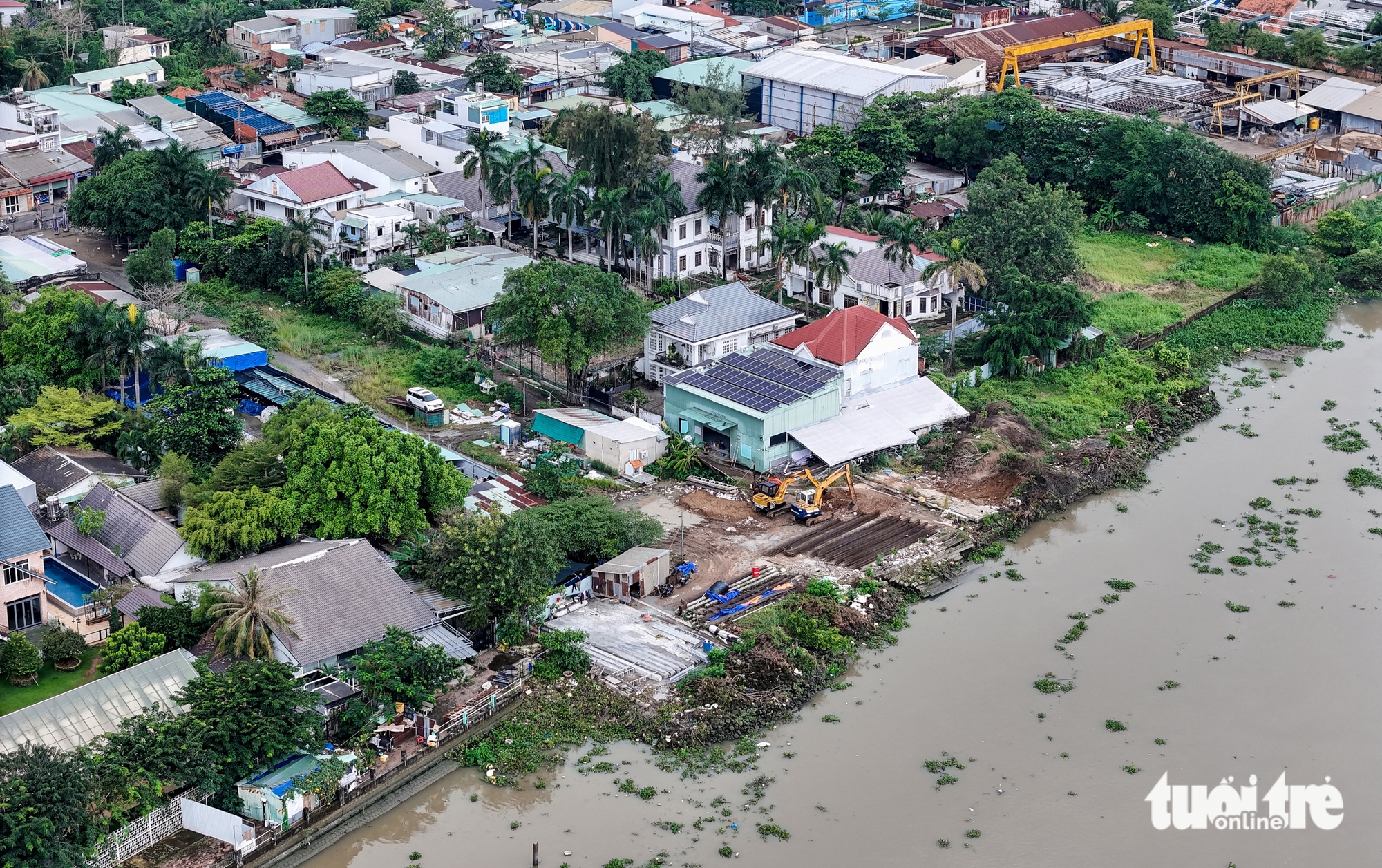 Triều cường liên tục ‘tấn công’, dự án kè quanh Thanh Đa sao mãi chưa xong? - Ảnh 1.