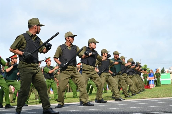 Lực lượng bảo vệ an ninh, trật tự cơ sở ở Tiền Giang diễn tập ra mắt. Ảnh: Bộ Công an