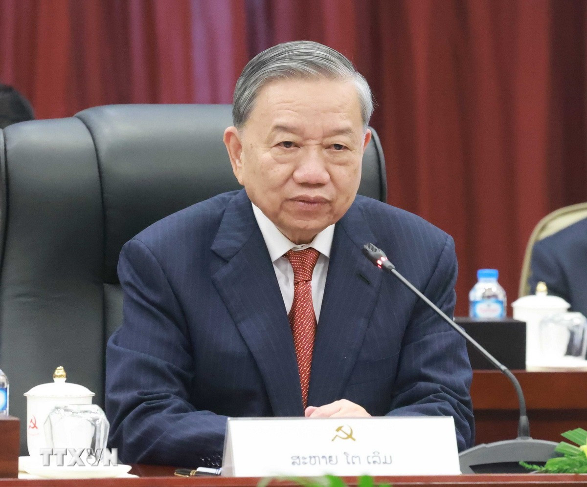 Cuộc gặp cấp cao giữa Đảng Cộng sản Việt Nam và Đảng Nhân dân Cách mạng Lào - Ảnh 6.