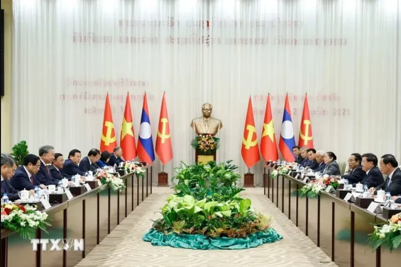 cuoc-gap-cap-cao-giua-dang-cong-san-viet-nam-va-dang-nhan-dan-cach-mang-lao.jpeg