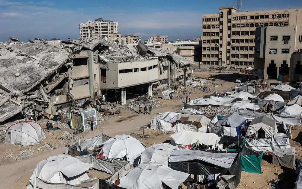 Các lều tạm ở khuôn viên Đại học Hồi giáo, TP Gaza (bắc Gaza) vào ngày 2-12. Ảnh: Omar Al-Qattaa/AFP AFP__20251202__86TR3JF__v2__HighRes__PalestinianIsraelConflictEducation-e1764686460569.jpg