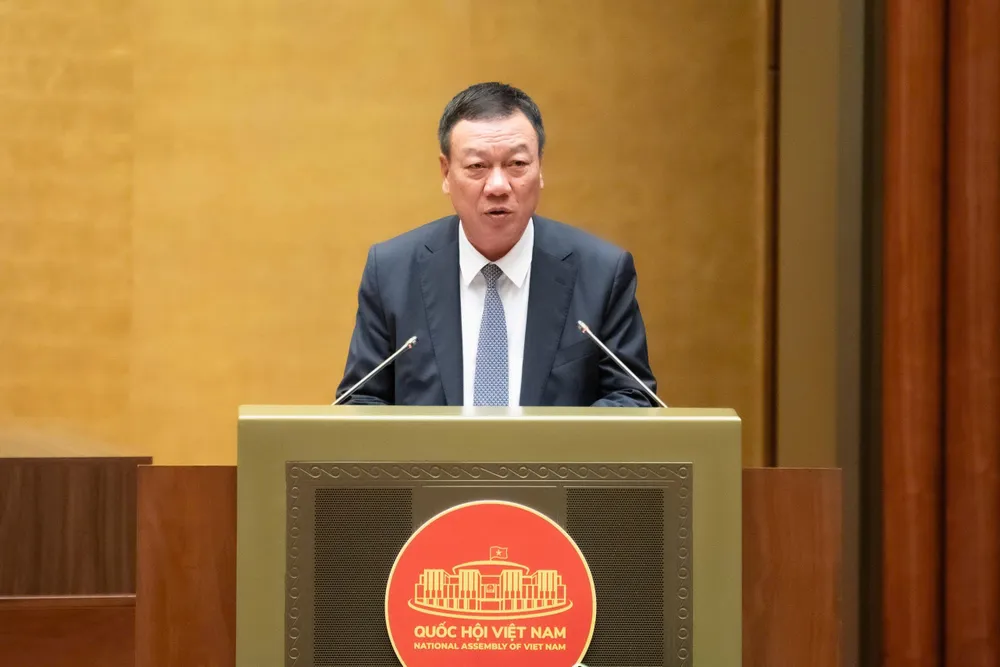Tổng Thanh tra Chính phủ Đoàn Hồng Phong trình bày báo cáo tiếp thu, giải trình, chỉnh lý dự án Luật. Ảnh: QH 202512101451166894_z7312129731256_1c01bb6e9f75cb0e6e891420faf467d8.jpg