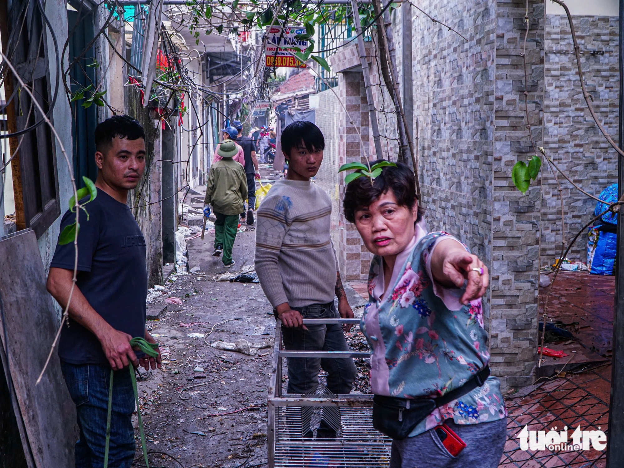 Phá dỡ hàng loạt nhà 'mặt phố' đường Đê La Thành xây đường vành đai 1 14 Đê La Thành - Ảnh 14.