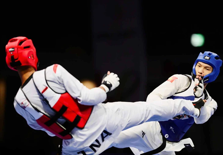 Điền kinh và các môn võ 'tỏa sáng' giúp Việt Nam chạm mốc 30 HCV ở SEA Games 33 9 SEA Games - Ảnh 9.