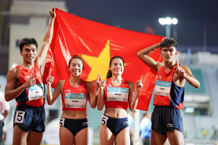 Đội điền kinh tiếp sức Việt Nam xuất sắc ra sao khi đánh bại Thái Lan? 7 điền kinh - Ảnh 7.