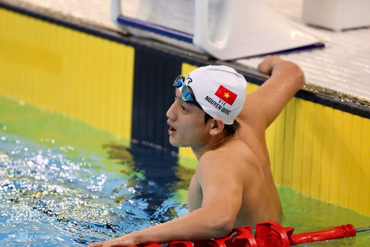 Nguyễn Quốc sau màn trình diễn xuất sắc ở nội dung bơi 200 m tự do nam. Ảnh: Hiếu Lương