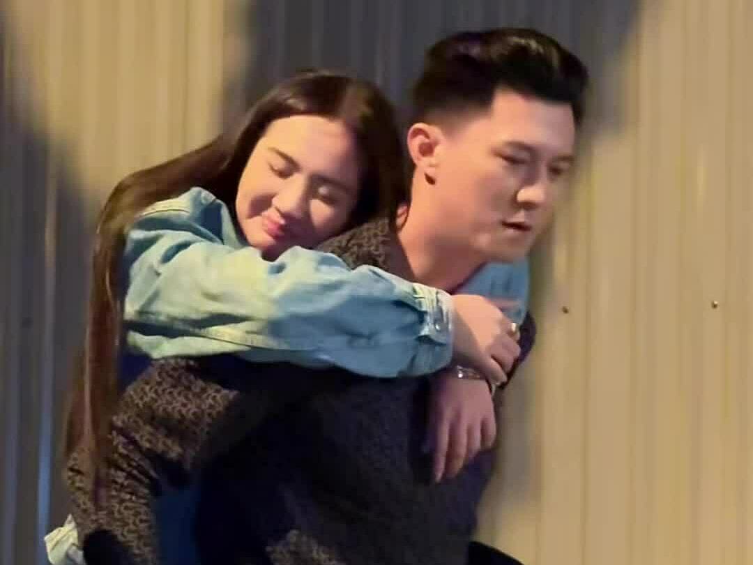 Huyền Lizzie và Hà Việt Dũng trong hậu trường phim