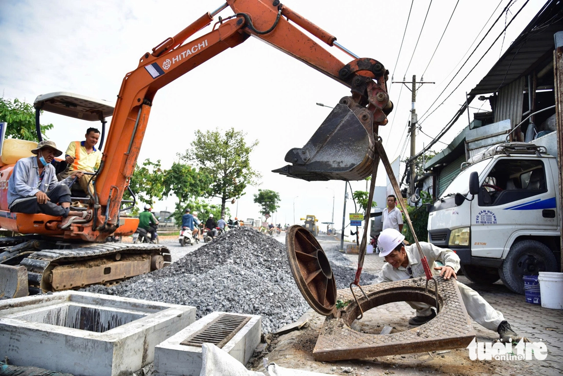 Đội ‘thần đèn’ hoàn tất nhấc cầu Bình Phước 1 nặng 9.000 tấn lên thêm 1,25m 4 Cầu Bình Phước 1 - Ảnh 4.