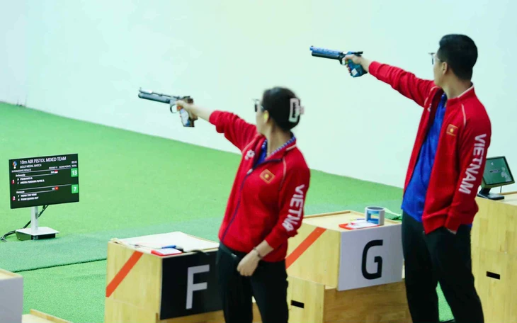 Điền kinh tỏa sáng với 'hat-trick vàng' giúp Việt Nam chạm mốc 40 HCV trong ngày 15-12 25 điền kinh - Ảnh 26.