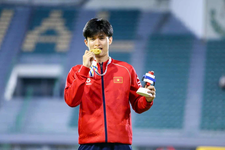 Điền kinh tỏa sáng với 'hat-trick vàng' giúp Việt Nam chạm mốc 40 HCV trong ngày 15-12 9 điền kinh - Ảnh 9.