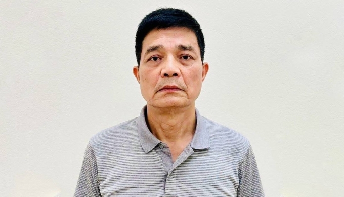 Cục trưởng Nguyễn Thanh Phong lúc bị bắt. Ảnh: Bộ Công an