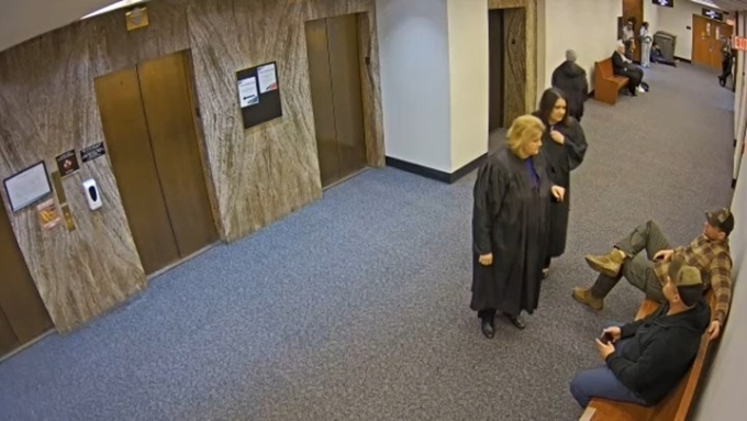 The surveillance footage released by Milwaukee County appears to show Dugan, wearing her black robes, confronting ICE agents in the courthouse hallway. (Milwaukee County)