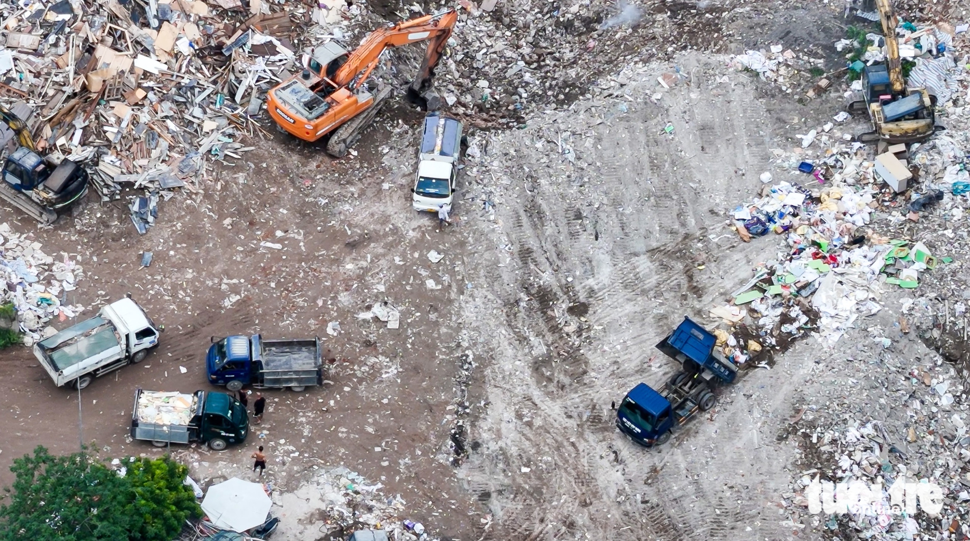 Bộ NN-MT yêu cầu xử lý nghiêm nạn đổ trộm rác thải xây dựng sau điều tra của Tuổi Trẻ - Ảnh 4.