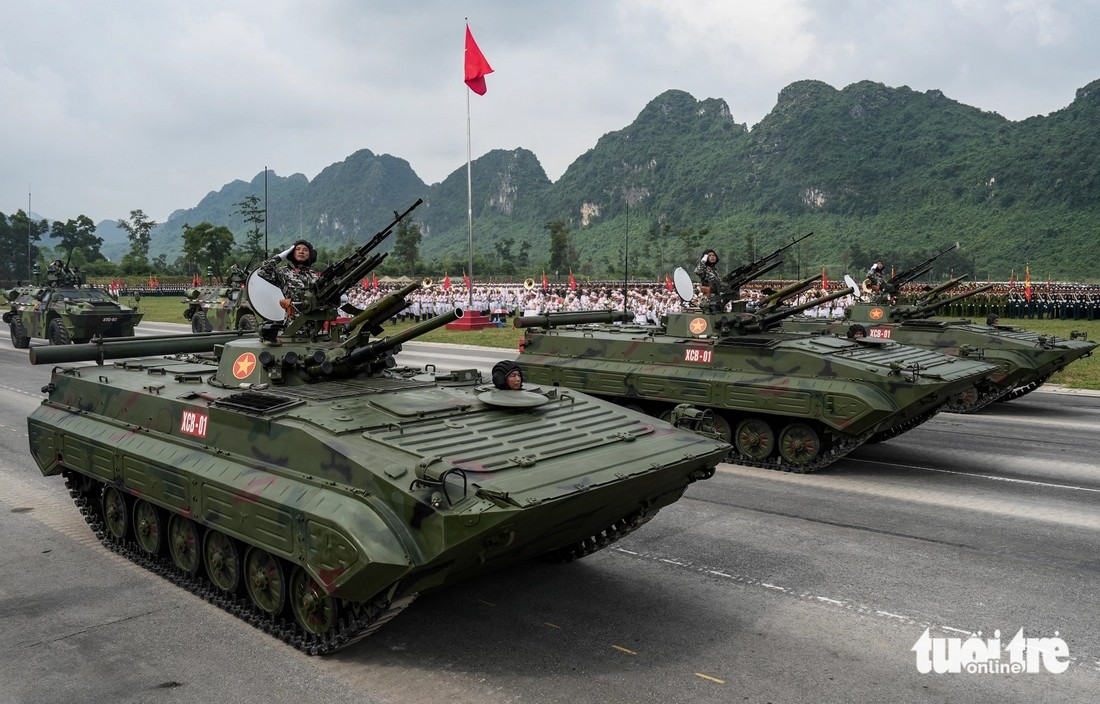 Quân đội nhân dân vững bước dưới cờ Đảng quang vinh - Ảnh 7.