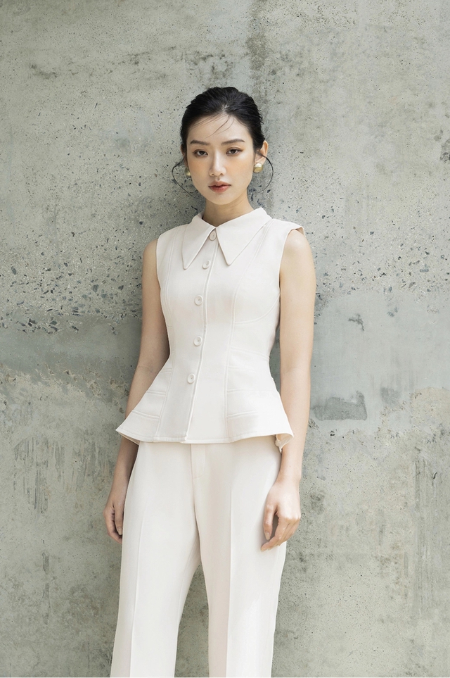 Áo peplum định nghĩa lại vẻ đoan trang trong thời trang công sở hiện đại- Ảnh 2.