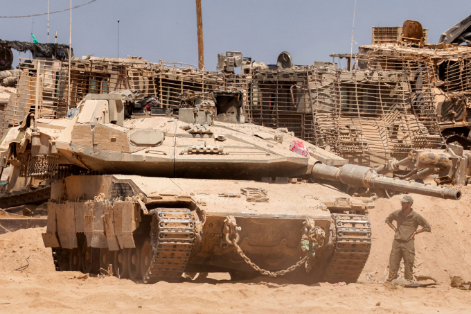 Xe tăng quân đội Israel tại một khu vực gần ranh giới Israel - Gaza ngày 29/7. Ảnh: AFP