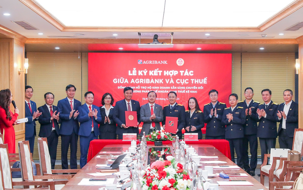 Agribank và Cục Thuế ký hợp tác hỗ trợ hộ kinh doanh chuyển đổi kê khai thuế - 1