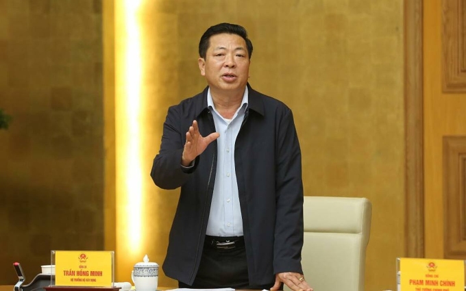 Bộ trưởng Xây dựng Trần Hồng Minh phát biểu tại cuộc họp, ngày 17/12. Ảnh: VGP