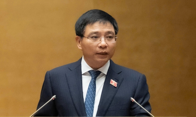 Bộ trưởng Tài chính Nguyễn Văn Thắng báo cáo giải trình tại phiên họp sáng 11/12. Ảnh: Media Quốc hội